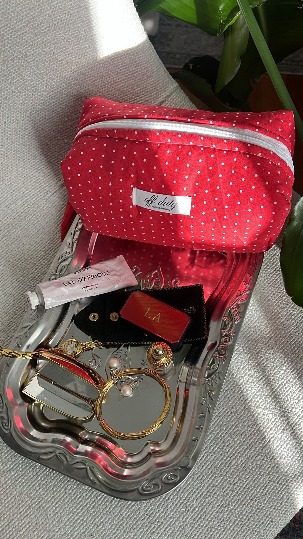 Bolsa de lunares rojos