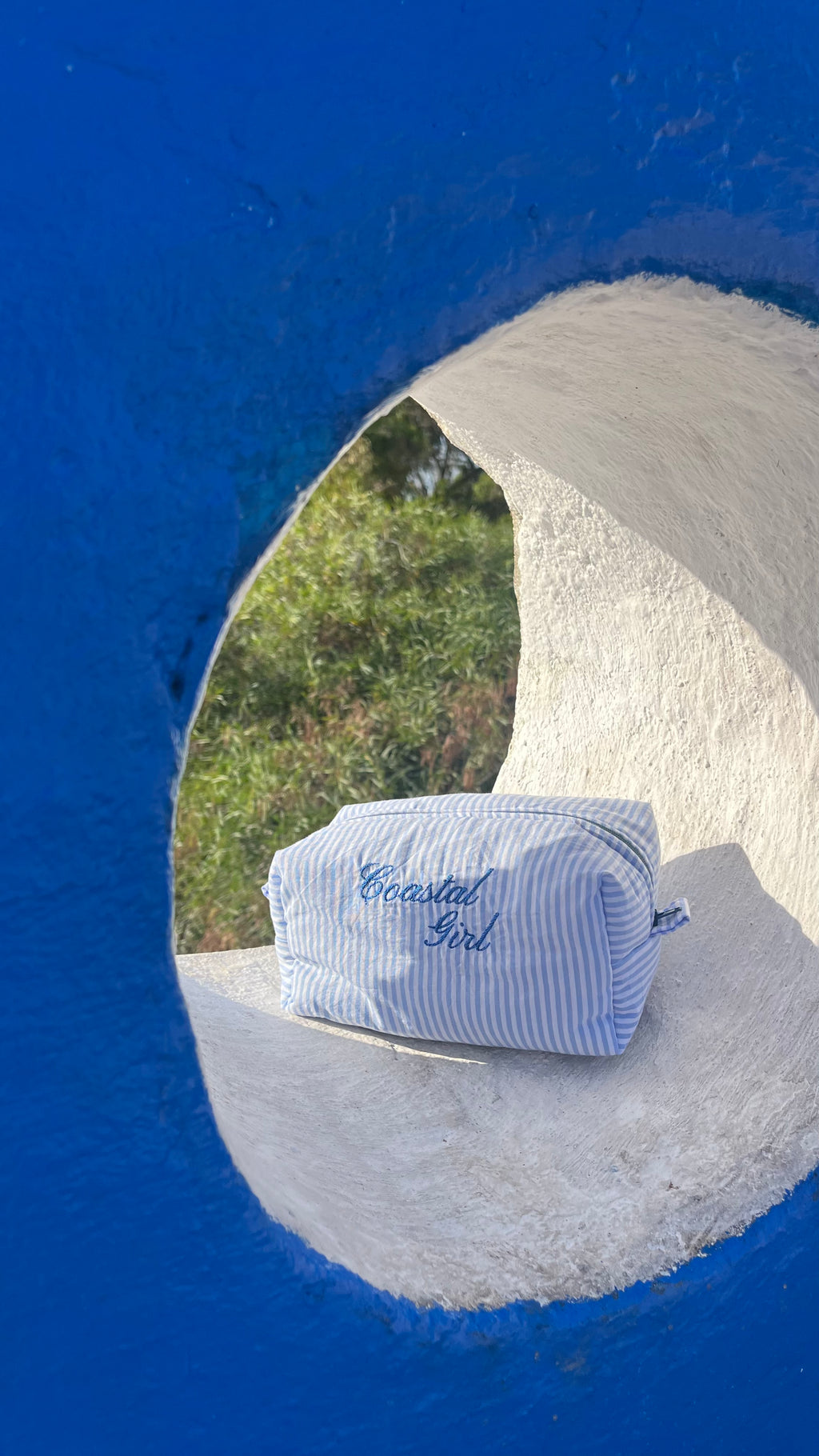 "Coastal Girl" blue striped pouch