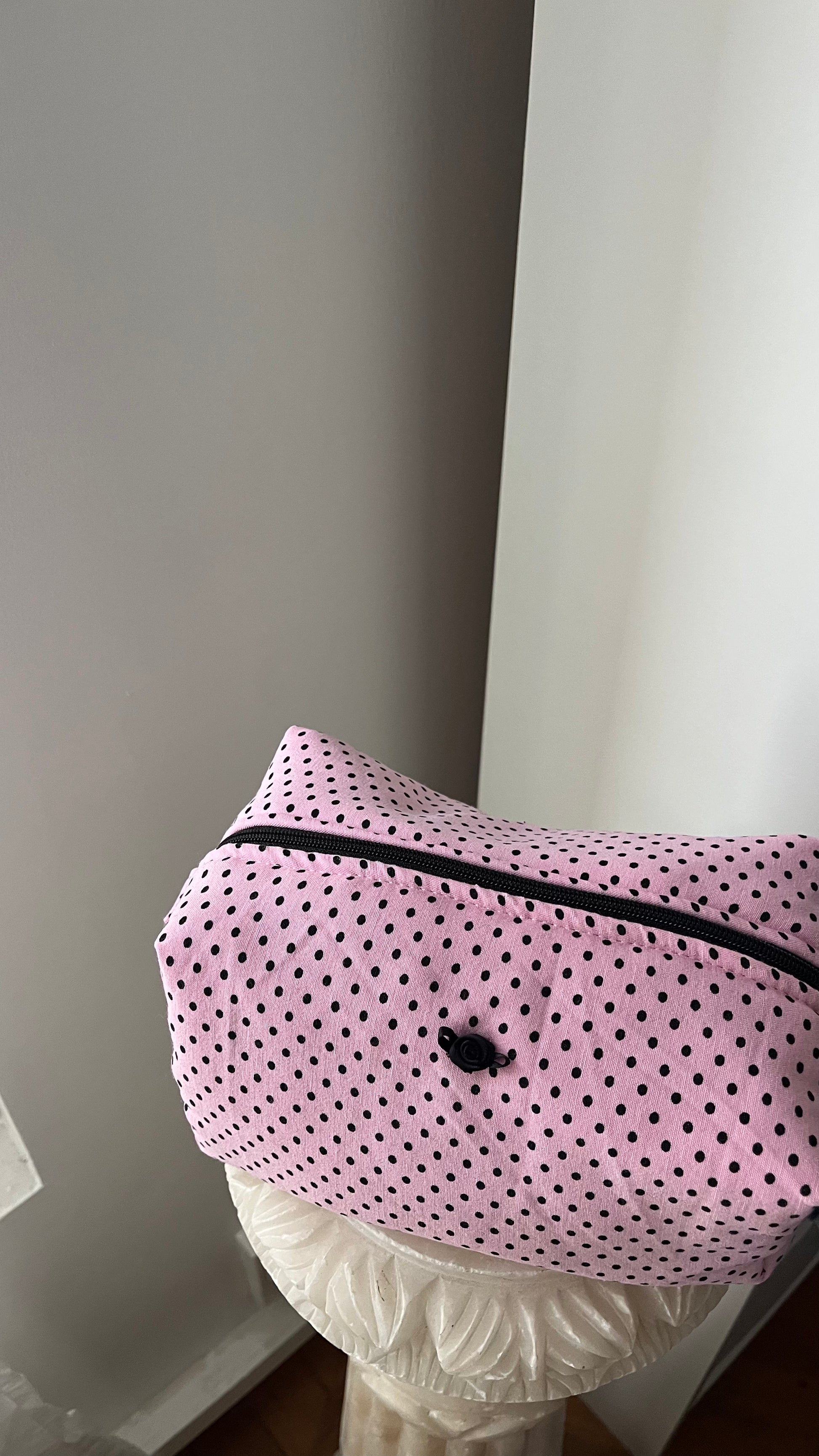 Pink and black polka dot pouch with black rose button
